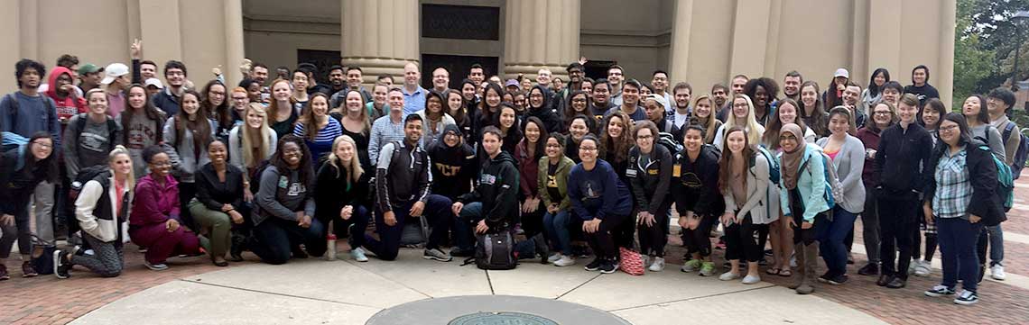 Large group of Pharmacy students in front of the Egyptian Building