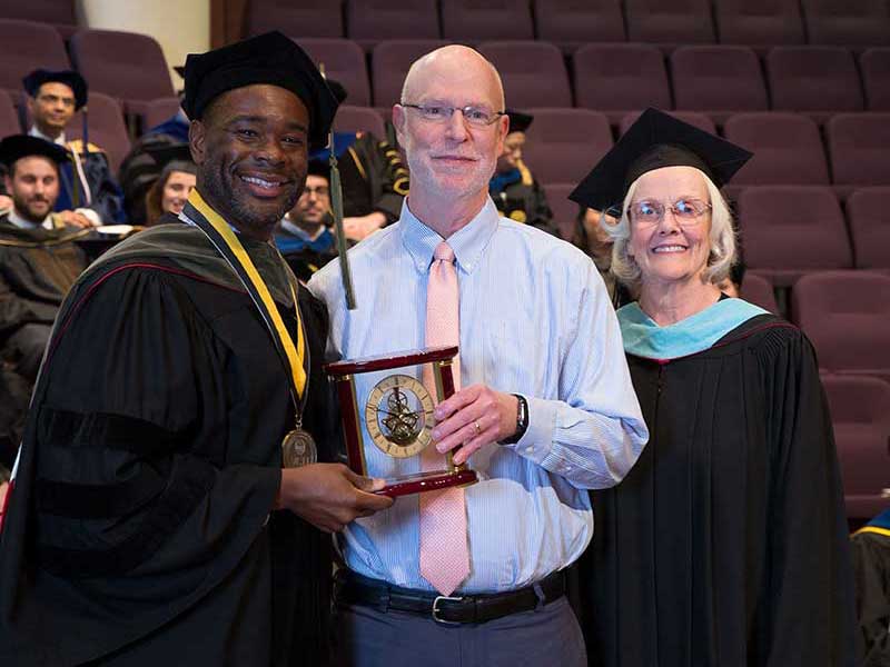 VCU School of Pharmacy Dean K.C. Ogbonna, Pharm.D., David Volles, Pharm.D., and Director of OEE Wanda Coffey.