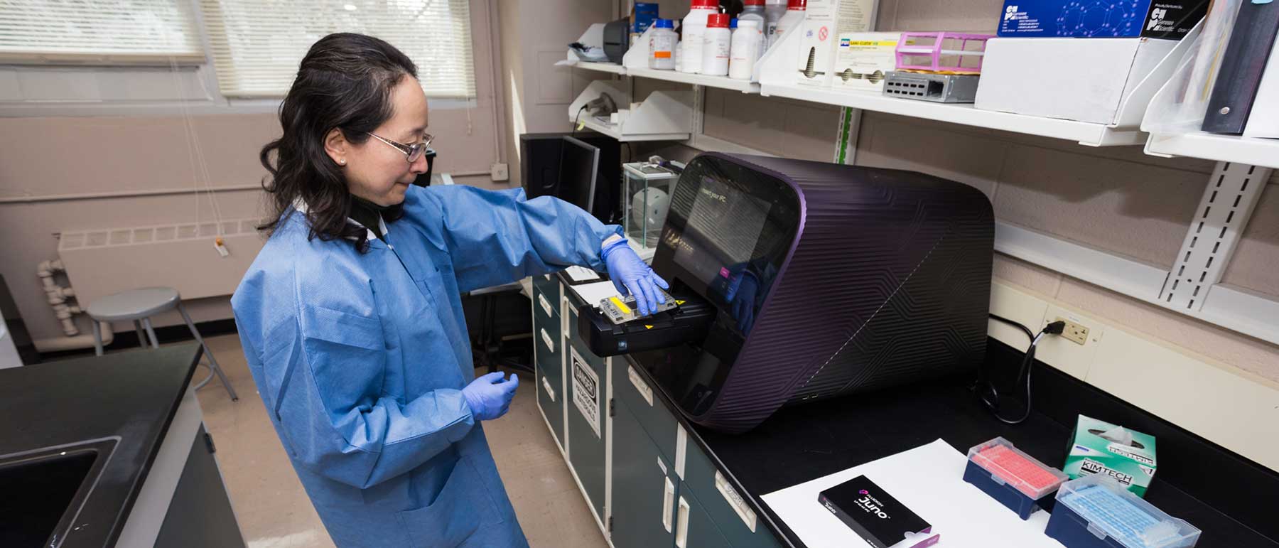 A researcher works in a research lab.